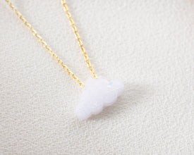 Delicate opal pendant necklace, perfect for dreamers and sky lovers.