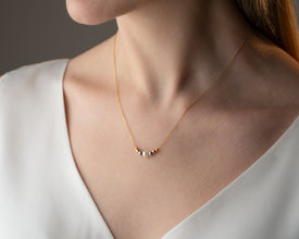 Freshwater pearl necklace strung on fine silk thread