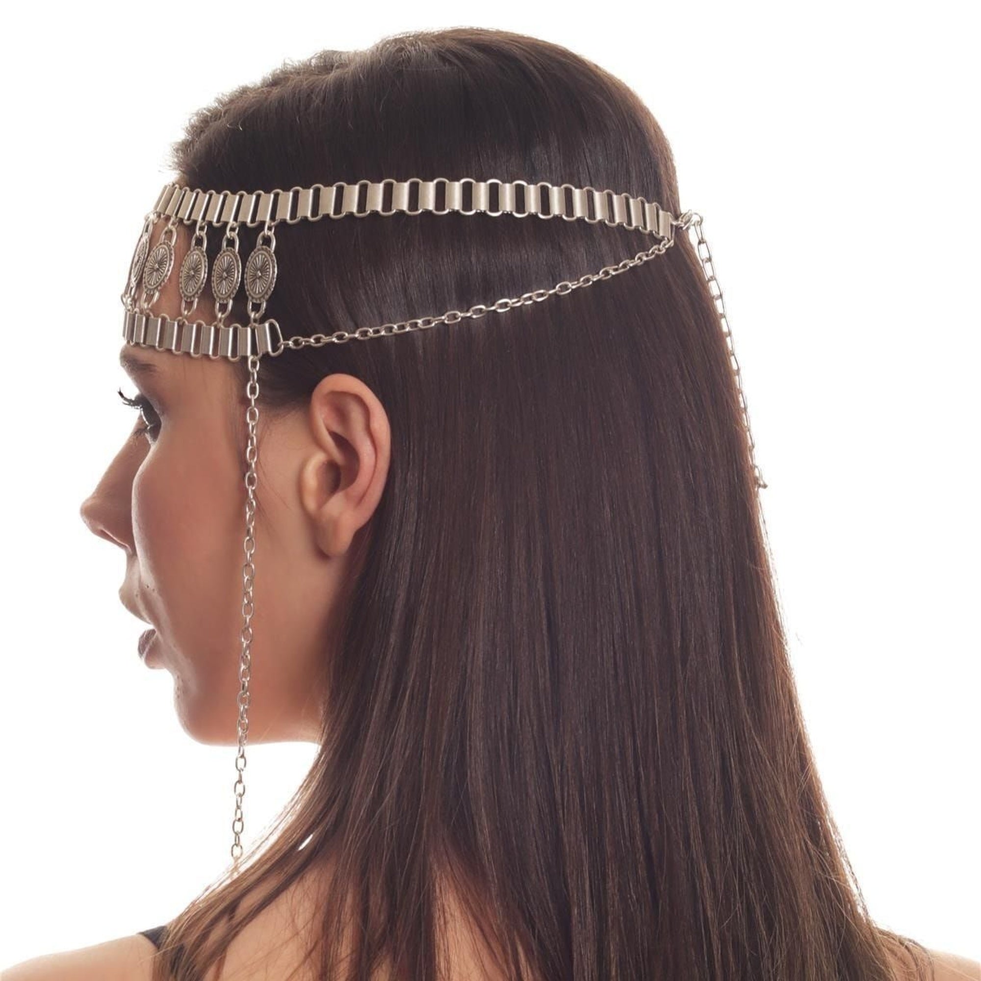 Woman wearing a silver chain headpiece on a white background