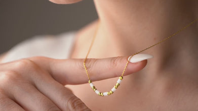 Layered dainty gemstone necklaces for styling inspiration