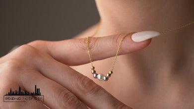 Model wearing freshwater pearl necklace with casual attire