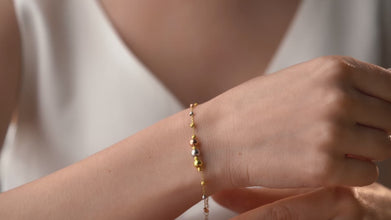 Mother and daughter wearing matching mixed metal bracelets