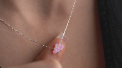 Celestial-inspired pink opal necklace in sterling silver and gold plating.