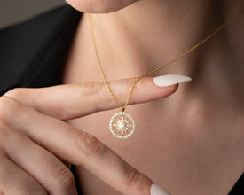 Handmade golden sunbeam necklace in sterling silver with gold plating, perfect for celestial jewelry lovers.