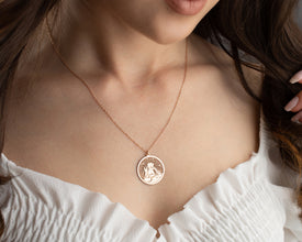 Whimsical literary-inspired silver pendant, ideal for everyday elegance.