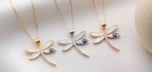 Sterling silver dragonfly necklace with evil eye charm, a symbolic pendant representing protection, luck, and light — a meaningful spiritual gift for her.