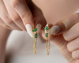 Minimalist jewelry capsule featuring stackable lotus earrings