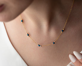 geometric-beaded-necklace-flatlay