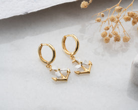 Front view of Anchor Propeller Hoop Earrings in sterling silver