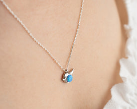 Gift-ready bird charm necklace in sterling silver, perfect for birthdays and anniversaries.