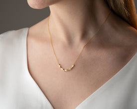 Outfit inspiration featuring gold bead gemstone necklace