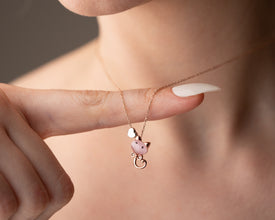 Whisker necklace displayed in a gift box with ribbon