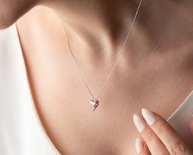 Handmade sterling silver hummingbird necklace featuring a delicate nature-inspired pendant.