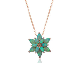 Handcrafted sterling silver lotus pendant necklace with an ethereal green opal gemstone centerpiece.
