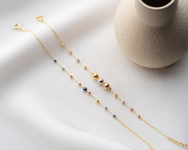 WFH styling: bracelet with laptop and notebook