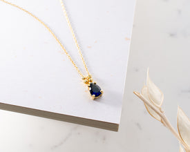Classic sterling silver blue sapphire necklace, ideal for gift giving.