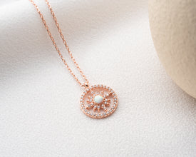 Dainty and versatile golden sunbeam necklace, perfect for layering with other delicate jewelry.