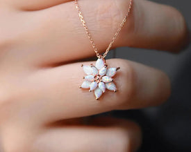 Handcrafted sterling silver lotus necklace, a timeless symbol of resilience and renewal.