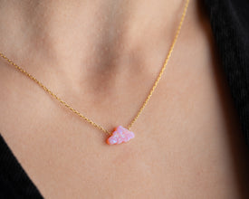 Ethereal pink fire opal jewelry for women, featuring a sunset-like glow.
