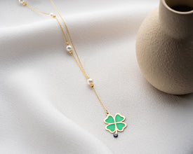 Strength and luck charm jewelry displayed on stand