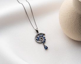 Necklace length comparison: choker vs. opera styling on pale skin