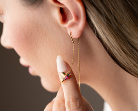 Lightweight dangle earrings styled with casual outfit