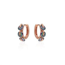 Pair of hoop earrings with multicolored stones on a white background