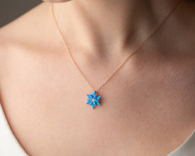 Yoga-inspired silver lotus necklace with a dainty opal pendant