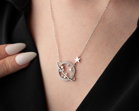 Gift-ready celestial necklace with a silver Saturn planet charm, beautifully packaged for astrology lovers and cosmic dreamers.